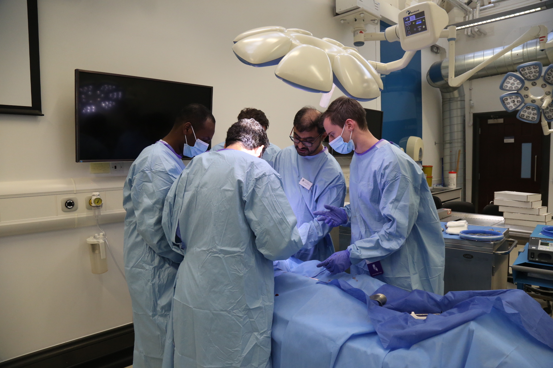 Delegates round a patient